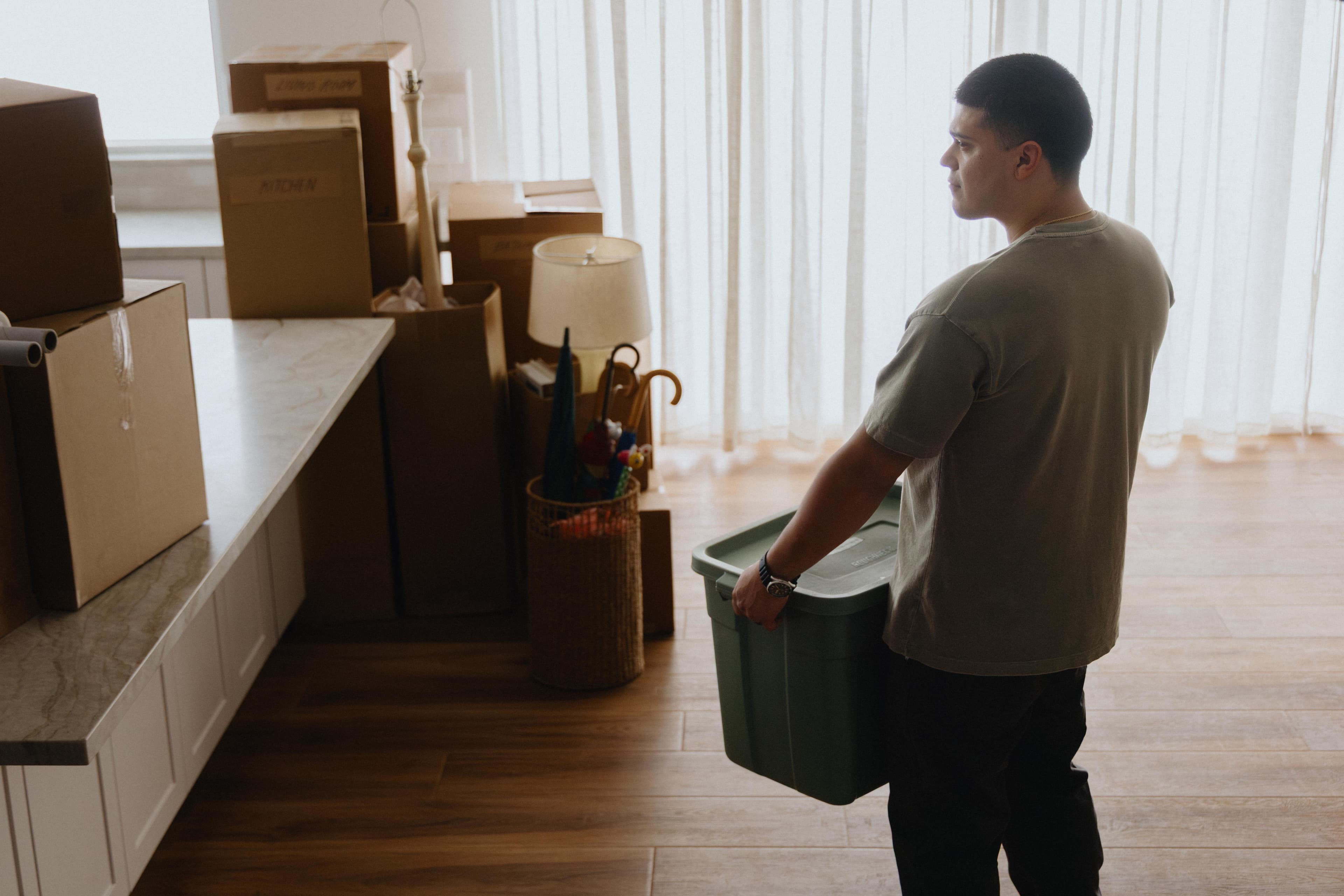 photo of person moving into house